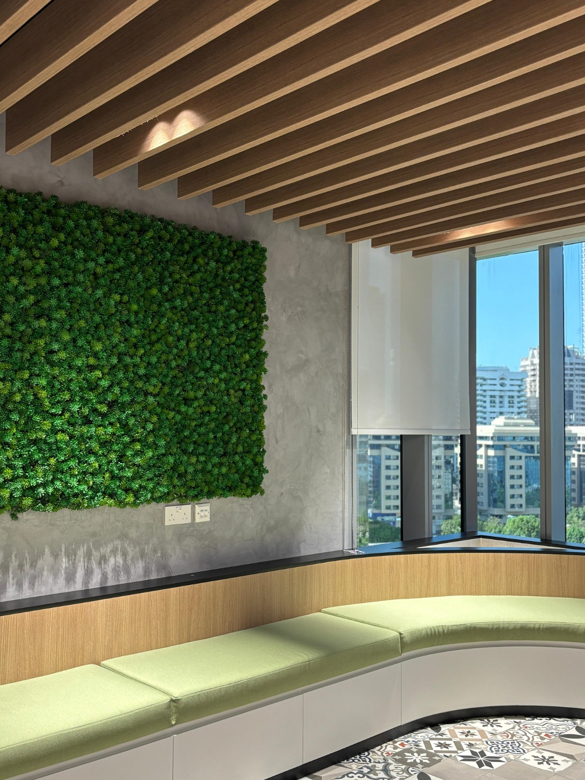 Biophilic Green Wall and Architectural Wood Ceiling Office Interior Design Dubai