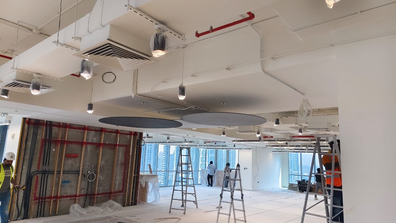 Collaborative acoustic consultancy meeting with architects and engineers