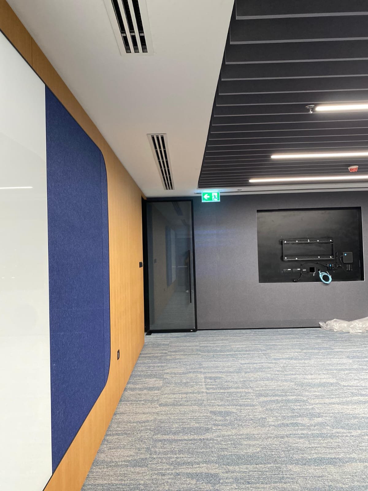 Modern open plan corporate office with acoustic treatment